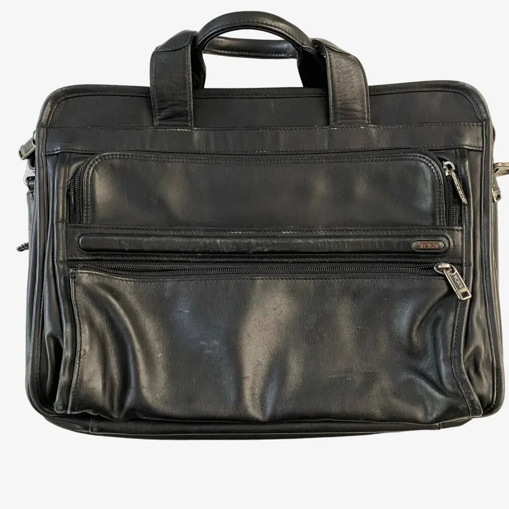 TUMI Black Leather Laptop Briefcase with Multiple Compartments